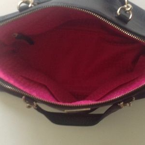 Black Kate Spade handbag.